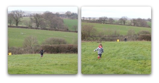 Children running around in a large garden
